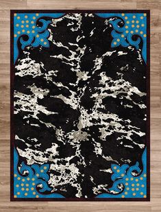 a black and blue rug with an abstract design