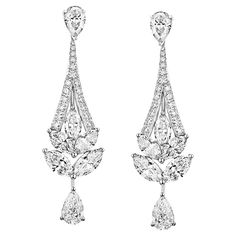 An incredible pair of chandelier earrings by Graff showcasing 7.79cts of the finest diamonds mounted in platinum. The earrings measure 1.92" in length. Khuyen Tai, Jewelry Tattoo Designs, Aesthetics Jewelry, Expensive Earrings, Character Jewelry, Graff Diamonds, Trending Crafts, Beautiful Diamond Earrings, Diamond Chandelier Earrings