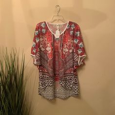 Multicolored Short Sleeve Mesh Top. Beautiful Design. Can Be Worn As A Top Or As A Bathing Suit Cover Up. L/Xl Chest: 23” Length: 25” - 32” Red V-neck Top For Beach Season, Casual Multicolor Print Blouse For Vacation, Casual Beach Blouse With Boho Print, Red V-neck Tops For Beach Season, Colorful Patterned Blouse For Beach In Summer, Casual Boho Print Blouse For Beach, Colorful Pattern Summer Beach Blouse, Colorful Summer Beach Blouse, Red Bohemian Blouse With Paisley Print