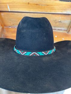 Handmade hatband! Custom Hat Bands For Rodeo, One Size Fits Most, Custom Adjustable Hat For Rodeo, Handmade Black Hat Bands For Country Events, Handmade Curved Brim Hat Band For Country Events, Adjustable Hat Bands With Flat Crown For Rodeo, Handmade Southwestern Hats For Ranch, Traditional Handmade Black Hat Bands, Adjustable Custom Top Hat For Country Events, Handmade Artisan Hat Bands For Western-themed Events