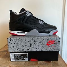 Elevate Your Sneaker Game With These Limited Edition Nike Air Jordan 4 Iv Retro Bred Reimagined Sneakers. Featuring A High-Top, Lace-Up Style And Synthetic Upper Material, These Sneakers Are Perfect For Any Occasion. The Colorblock Design In Black And Cement Will Make You Stand Out From The Crowd, While The Cushioned Sole Ensures Comfort All Day Long. These Jordans Are A Must-Have For Any Sneakerhead. Don't Miss Out On The Chance To Own A Piece Of Sneaker History. 100% Authentic. In-Hand Ready T Urban Air Jordan 4 With Boost Midsole For Streetwear, Air Jordan 4 Black With Red Sole For Sports, Air Jordan 4 With Air Max Cushioning For Streetwear, Air Jordan 4 Black With Red Sole For Streetwear, Black Air Jordan 4 With Red Sole, Black Air Jordan 4 With Boost Midsole For Streetwear, Black Air Jordan 4 With Red Sole And Leather, Air Jordan 4 With Boost Midsole For Streetwear, Air Jordan 4 Black Synthetic For Streetwear