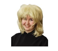 a woman with blonde hair wearing a black shirt and smiling at the camera while standing in front of a white background