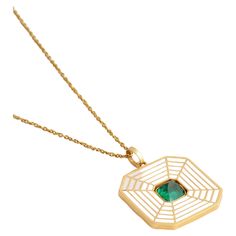 A reversible pendant with pink enamel on one side and white and blue enamel on the other. The pendant has an Octagon shaped Natural Emerald in the center weighing 0.80 carats. The pendant including the chain is made in 18-karat gold. It's an extremely versatile piece that can be worn individually with practically any outfit or added with any other longer or shorter chain for layering. Enamel Necklace With Detachable Pendant, Luxury White Enamel Necklace, Enamel Gemstone Pendant Necklace, Luxury Enamel Necklace With Polished Finish, Luxury Enamel Necklaces With Polished Finish, Luxury Enamel Jewelry With Detachable Pendant, Luxury Polished Enamel Necklaces, Luxury Enamel Round Pendant Jewelry, Luxury Enamel Pendant Jewelry