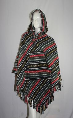 100% Cotton Made in Nepal  Suitable for Vegans Warm fashionable ponchos with hood and pockets for Winter Length approx 80cm from shoulder to the triangle point on bottom Width approx 100cm  Weight approx 1kg Buttons to adjust. THANKYOU FOR STOPPING BY Poncho Hoodie, Winter Poncho, The Triangle, Nepal, Gender Neutral, Adult Outfits, Australia, Quick Saves, Clothes