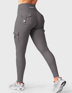 Discover our Hedda Cargo Leggings, crafted from durable four-way stretch fabric with practical pockets. Enjoy a stylish cargo design that enhances your curves, they offer the perfect blend of comfort and functionality for any workout!   Feature    High waist support   Hidden scrunch   Cargo pockets   4-way stretch, lightweight   No front seam, no camel toe   Moisture-wicking, breathable   25-inch inseam    Fabric     75% Nylon + 25% Spandex    Model Measurements    Model Wear: S   Height: 173cm / 5'7"   Bust: 87cm / 34.3″   Waist: 62cm / 24.4″   Hips: 97cm / 38.2″ Cargo Design, Cargo Leggings, Legging Fits, Leggings With Pockets, Sport Bra Top, Gym Yoga, Gym Leggings, V Cuts, Sport Shorts