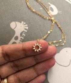 Small CZ Sun Necklace-Gold Filled Chain-Sun Necklace-Gold Sun Necklace-Dainty Necklace-Everyday Necklace-CZ Necklace-Trendy Necklace-Gift~~~~~~~~~~~~~~~~~~~~~~~~~~~~~~~~~~~~~~~ITEM DETAILS* * Gold Plated CZ Sun Charm 10x9mm* * 14k Gold Filled Flat Cable Chain 🔔✨🔔 Claim your 10% Coupon by signing up to our mailing list (copy and paste link on URL) https://www.subscribepage.com/pinkslate  🔔✨🔔—SHIPPING DETAILS—*No Invoices are included in the package*If standard shipping is chosen, your item wi Dainty Round Jewelry With Sun Design, Dainty Sun Design Jewelry For Gifts, Dainty Sun Design Round Necklace, Hamsa Necklace Gold, Gold Circle Necklace, Necklace Everyday, Sun Charm, Gold Hamsa, Sun Necklace