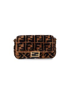 FENDI SHEEPSKIN 'BAGUETTE' BAG, BROWN FUR, ALL-OVER BLACK "FF" PATTERN, TOP HANDLE, REMOVABLE SHOULDER STRAP, MAGNETIC BUTTON CLOSURE, GOLDEN LOGO BUCKLE DETAIL ON FRONT, ONE INSIDE ZIP POCKET, ONE INSIDE MAIN COMPARTMENT. Size Type: STANDARDSKU: 8BR600 A8HPF180S Our Products Are 100% Genuine. In All Cases We Stand By The Authenticity Of Every Product Sold On Our Site. Fendi Women, Balenciaga Backpack, Golden Logo, Brown Fur, Baguette Bag, Louis Vuitton Shoulder Bag, Fendi Bags, Top Handle, Shoulder Strap