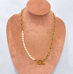 This versatile piece combines edgy style with sophistication, featuring a chunky textured chain and 14 freshwater pearls. The 19-inch length offers endless styling options, while the heart-shaped toggle clasp adds a sweet touch. Elevate any outfit with this bold and elegant necklace. Hypoallergenic (Lead and nickel free) Material: Stainless Steel, Freshwater Pearls Length: 19" (48cm) Hardware: Heart Toggle clasp Elegant Necklace, Edgy Style, Elegant Necklaces, Toggle Clasp, Edgy Fashion, Fresh Water, Freshwater Pearls, Heart Shapes, Pearl Necklace