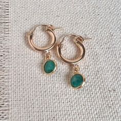 Green 14k Gold Hoop Earrings, Dainty May Birthstone Hoop Earrings, Small Hoop Green Earrings For May Birthstone, Dainty Green Huggie Hoop Earrings, Everyday Green Huggie Earrings, Everyday Green 14k Gold Earrings, Green Small Hoop Huggie Earrings For May Birthstone, Dainty Green Hoop Earrings, Green Hoop Earrings As A Gift