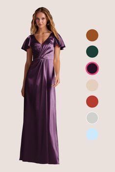 a woman in a long purple dress with different colors