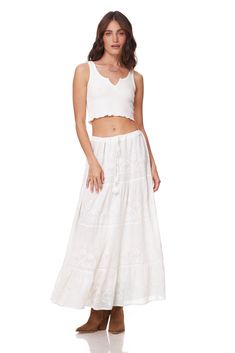 Serenity Embroidered Maxi Skirt Natural Adjustable With Ties at Waist Color: Natural Sizes One Size, Fits Size 2 to 10 100% Indian Cotton With a Lining Made in India White Bohemian Skirt With Embroidered Hem, Bohemian White Skirt With Embroidered Hem, Floral Embroidered Maxi Skirt, Flowy Tiered Skirt With Floral Embroidery, Tiered Floral Embroidered Skirt, Embroidered Hem Flowy Long Skirt, Bohemian Embroidered Skirt For Vacation, Bohemian Long Skirt With Floral Embroidery, Tiered Skirt With Floral Embroidery