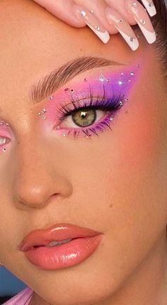 Crystals On Face, Pink Dance Competition Makeup, Pink Ombre Eyeshadow, Pink Purple Eyeshadow Looks, Pink Purple Makeup Looks, Purple And Pink Eyeshadow Looks, Purple Rhinestone Makeup, Pink Makeup With Rhinestones, Makeup Looks Artistic