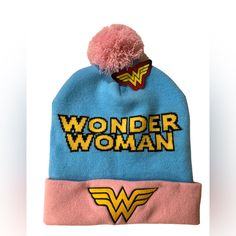 This Cozy Wonder Women Winter Hat Has Very Unique Baby Pink And Baby Blue Colors. It Is New With Tags, Soft And Stretchy. #Wonderwoman #Dccomics #Superman #Batman #Dc #Justiceleague #Dcuniverse #Aquaman #Galgadot #Comics #Flash #Dceu #Theflash #Marvel #Joker #Dianaprince #Ww #Harleyquinn #Greenlantern #Love #Cyborg #Art #Cosplay #Superhero #Spiderman #Henrycavill #Supergirl #Brucewayne #Zacksnyder #Avengers #Girlpower #Girl #Love #Girls #Womenempowerment #Girlboss #Fashion #Instagood #Women #Bea Pink Novelty Winter Hats, Fun Pink Beanie Hat, Fun Pink Hat, One Size, Pink Cotton Beanie, One Size Fits Most, Trendy Adjustable Pink Beanie, Pink Cotton Beanie (one Size Fits Most), Trendy Pink Beanie, Trendy Blue Beanie, Pink Cotton Beanie