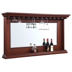 a mirror with wine glasses and bottles on it