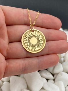 14k Solid Gold Sunflower Necklace, Personalized Sunflower Pendant, Gold Sunflower Coin 14k Solid Gold Choose What Size You Want the Pendant Using The First Option Box Choose Chain Length Or Without Chain Using The Second Option Box Photos Are For The 25.4 mm / 1 Inch Diameter Pendant Pendant thickness : 0.7mm  Contact us if you want it thicker Inner diameter of jump ring : 5mm Contact us if you need it bigger  Chain width : 1.30mm     ♥ Material of pendant and chain: Solid Gold k14 ♥ Packaging: 14k Gold Round Birth Flower Jewelry, Yellow Round Sunflower Jewelry, Gold Hallmarked Flower-shaped Jewelry, Yellow Flower Shaped Jewelry For Anniversary, Yellow Flower-shaped Jewelry For Anniversary, Anniversary Round Flower Charm Necklace, Yellow Gold Flower-shaped 14k Stamped Jewelry, Yellow Gold Jewelry With Sunflower Design As Gift, Gold Flower-shaped Jewelry For Anniversary