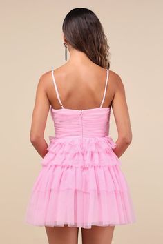 An attention-worthy look like the Lulus Special Poise Pink Tulle Pleated Sleeveless Tiered Mini Dress will have everyone in awe all night long! Layers of sheer tulle mesh shape this iconic dress that features a pleated, sleeveless bodice, a flirty V-neckline, and adjustable spaghetti straps. A flattering, set-in waist sits atop a flouncy, tiered skirt that finishes at an alluring mini hem. Hidden back zipper/clasp. Fit: This garment fits true to size. Length: Mid-thigh. Bust: Great for any cup s Glamorous Sleeveless Mini Dress With Ruched Bodice, Pink Sleeveless Mini Dress With Lined Bodice, Sleeveless Mini Dress With Lined Bodice For Homecoming, Feminine Sleeveless Straps Mini Dress, Flirty Sleeveless Dress With Straps, Feminine Sleeveless Mini Dress With Straps, Sleeveless Party Dress With Lined Bodice For Spring, Sleeveless Dresses With Fitted Bodice And Ruffles, Flirty Sleeveless Dress With Adjustable Straps