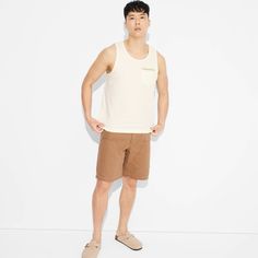 Tank top with a crew neckline made from 100% cotton for a soft feel and all-day comfy wear. Tailored in a regular fit with a length that hits at the hip. Pullover style completes the design and allows for easy on and off. If you're not satisfied with any Target Owned Brand item, return it within one year with a receipt for an exchange or a refund. Original Use™: Always the next evolution. Comfy Wear, Jeans Online, Men's Tank, Mens Crew Neck, Bottom Clothes, Chino Shorts, Casual Fits, Athletic Shorts, Mens Tank Tops