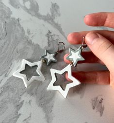 Star earrings. Custom hand made, charm star earrings. These earrings are completely hand sculpted, painted, and sealed with super fine detail. I put lot of time and effort into everything I make :] it's more then jewelry , it's a wearable sculpture and art made by me :D Handmade Star-shaped Earrings For Gift, White Star-shaped Earrings As Gift, White Star-shaped Nickel-free Earrings, White Star Charm Earrings As Gift, White Star-shaped Earrings With Star Charm, Y2k Earrings, Star Earrings, Jewelry Earrings Dangle, Etsy Earrings