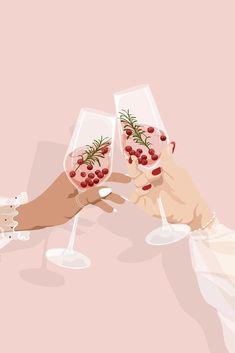 two people toasting with wine glasses filled with red berries and rosemary sprigs