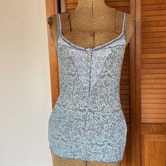 Vintage Rare Free People Ribbed Pointelle Henley Camisole In Indigo Floral Print With Lace Detail At The Neck And Snaps. Lace Trim Along The Neck And Spaghetti Straps. Slim Fit But Stretches Quite A Bit. Bust Stretches Up To 18” Approx. Absolutely Love This Style. New With Tags 100% Cotton Size Large Fitted Tank Strap Tops For Daywear, Fitted Tops With Tank Straps For Daywear, Fitted Light Blue Camisole Tank Top, Light Blue Cotton Sleeveless Camisole, Light Blue Fitted Cotton Tank Top, Fitted Tank Top For Daywear, Light Blue Fitted Cami Top, Fitted Sleeveless Camisole For Daywear, Fitted Sleeveless Daywear Camisole