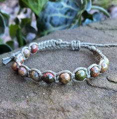 Unakite Hemp Bracelet | Adjustable Nature-inspired Adjustable Beaded Bracelet With Round Beads, Adjustable Brown Jasper Bracelet, Adjustable Hand Wrapped Spiritual Bracelet, Nature-inspired Adjustable Hand-strung Jewelry, Adjustable Jasper Beaded Bracelets With Round Beads, Adjustable Earthy Beaded Bracelets For Meditation, Adjustable Jasper Jewelry For Healing, Adjustable Spiritual Braided Bracelets For Healing, Adjustable Nature-inspired Bracelets With 8mm Beads