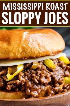 a close up of a sandwich on a plate with the words mississippi roast sloppy joes