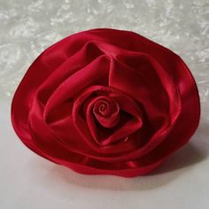 "Handmade Fushia Satin Ribbon Rose Brooch and Hair Clip. Available in many colors. Listing is for one rose pin/hair clip. This versitile two-in-one rose pin hair clip can be worn as a Flower pin/brooch on clothing, hats, scarves and more, for occasions such as, church functions, Anniversary, Weddings, Cocktail Parties, Proms or everyday wear. Wear as a flower hair clip to add a touch of elegance to various hair styles . In addition to wearing as a hair clip, it can, also, be clipped on gifts as an alternative to gift bows. Each rose was made from wired ribbon in various colors. Green ribbon sepals were added to each rose for a more realistic look. I have hot glued a 1.5\" silver-plated pin back with locking bar and a 1.75\" flat silver-plated alligator hair clip backing to each pin/clip fo Rose Flower Brooch For Party, Rose Flower Brooch Gift, Handmade Red Hair Accessories For Gifts, Hair Clip Flower, Satin Ribbon Roses, Rose Hair Clip, Brooch Corsage, Ribbon Rose, Rose Brooch