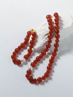 Enhance your style with our stunning Natural Red Agate Necklace and Bracelet set, symbolizing the vibrant energy of the New Year with hues of luck and prosperity. Perfect for the Lunar New Year, these unique pieces feature natural agate beads in shades ranging from translucent tomato red to rich cherry red. Pairing elegance with sophistication, this set is a must-have for the upcoming celebrations. Metal: 18K Recycled Gold Plated On Brass Gemstone: Red Agate/Freshwater Baroque Pearl Pearl/Agate Red Agate Necklace, Agate Stone Necklace, Necklace And Bracelet Set, Gemstone Beaded Necklace, Onyx Necklace, Necklace And Bracelet, Red Agate, Agate Necklace, Lunar New Year