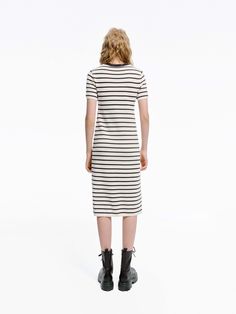 MO&Co. Women's Round Neck Striped Dress Crafted with a blend of wool and fabric, this mid-length T-shirt dress boasts a modern silhouette and stylish striped design. Perfectly pair with short boots for a minimalist, fashion-forward look. Features : - Midi T-shirt dress silhouette- Classic black and white stripes- Round neck, short sleeves Code: MBD1DRS038The back length of size S is 104cmMATERIALS & CARE Material: 67.7% Wool 32.3% PolyesterWrap metal parts before dry cleaning.REMINDER: All items Dress Crafts, Dress Silhouette, Color Stripes, Short Boots, Stripes Design, Striped Dress, Minimalist Fashion, T Shirt Dress, Mid Length