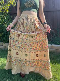 Pari Vintage vibe Light Brown Embroidery Maxi Skirt, perfect for embracing those boho hippie vibes! This stunning skirt features pleated boarder that adds a touch of elegance, while the maxi length offers a chic and comfortable fit. Crafted with fairycore fashion in mind, this skirt is ideal for creating enchanting cottage core looks. Whether you're strolling along sandy shores or exploring hideaways, this skirt will ensure you're dressed to impress. Its flowing silhouette captures the essence o Fairy Vibe, Cottage Core Fairy, Fairycore Fashion, Brown Embroidery, Enchanted Cottage, Dressed To Impress, Sandy Shores, Style Cottage, Floral Patchwork