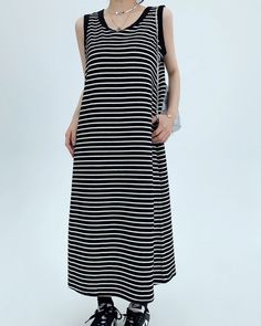 A tank top dress that you will want to wear in the coming season.

Not only can you wear it alone, but you can also wear it for many seasons by layering it with a shirt or knit cardigan.

We recommend styling your look with voluminous sneakers or sandals for a relaxed look.
◾️Model
Height/Weight：158cm(62.2in)/45kg(99.2lb)
Fitting Size：S





Cm
(inches)

Length
Chest
Shoulder


S
112(44.0)
94(37.0)
33(12.9)


M
114(44.8)
98(38.5)
33.8(13.3)


L
116(45.6)
102(40.1)
34.6(13.6)


XL
118(46.4)
106(41.7)
35.4(13.9) Casual Black Sleeveless Maxi Dress, Black Midi Dress For Spring Layering, Casual Midi Dress For Daywear, Casual Black Midi Dress For Day Out, Casual Black Cotton Midi Dress, Black Cotton Midi Dress Casual Style, Black Sleeveless Dress For Daywear, Striped Casual Maxi Dress For Day Out, Casual Sleeveless Maxi Dress