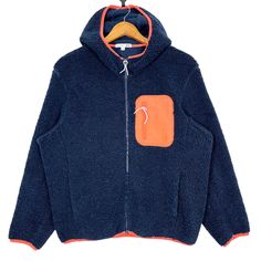 Uniqlo JW Anderson Zipper Hoodie Fleece Jacket Size Medium * Made in : China * Size on Tag : M * Manual Measurement (inch) : Chest 23.5, Length 25, Shoulder 18.5, Sleeve 22, Hem 18. * Recommended for Size : Medium (M) * Material : Polyester  * Colour : Navy Blue with Orange stripes  * Condition : Good * See photos for details. * Free Defect : No Stain, No Holes, No Tears, No Faded. 6515 Hooded Fleece Windbreaker With Fleece Lining, Fleece Jacket With Hoodie For Cold Weather, Cold Weather Fleece Windbreaker With Fleece Lining, Half-zip Fleece Hoodie For Outdoor, Fleece Half-zip Hoodie For Outdoor, Fleece Hooded Jacket With Pockets, Outdoor Fleece Half-zip Hoodie, Half-zip Fleece Hoodie For Outdoor Activities, Fleece Hooded Jacket With Drawstring Hood