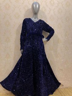 "This is a gorgeous sequin velvet stretchable maxi dress with full sleeves. It comes with a belt. Total flair is 140 inches all around. Length of the dress is 55 inches. Sizes available are  Small (chest 36\") Medium (chest 40\") Large (chest 44\")" Glamorous Velvet Maxi Dress, Festive Floor-length Sequin Evening Dress Fabric, Embellished Floor-length Winter Dresses, Winter Embellished Floor-length Dress, Glamorous Floor-length Velvet Gown, Winter Maxi Dress For Evening, Glamorous Velvet Floor-length Gown, Winter Floor-length Embellished Dresses, Winter Sequin Floor-length Dress