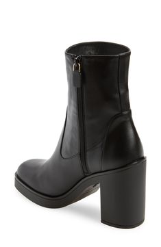 A chunky platform and block heel add statement-making height to a luxe bootie fashioned with a side zipper for easy entry. 3 3/4" heel; 3/4" platform (size 8.5) 6" shaft Side zip closure Leather upper and lining/synthetic sole Made in Spain Chunky Platform Boots With Block Heel For Work, Workwear Boots With Chunky Platform And Block Heel, Elegant Leather Platform Boots With Chunky Platform, Elegant Leather Platform Boots With Chunky Sole, Chic Chunky Platform Heeled Boots For Work, Platform Ankle Boots For Workwear, Chic Platform Boots With Lug Sole And Block Heel, Formal Boots With Chunky Platform Block Heel, Elegant Chunky Platform Boots For Formal Occasions