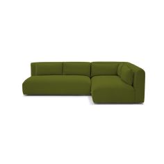 a green sectional couch with the back facing it's right arm and foot rest