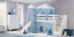 a child's bedroom with a princess castle bed and slide