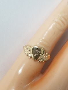 "Thanks for shopping our vintage estate store. We tend to sell well below wholesale and truly hope you enjoy all of our items. Many of the items are one of a kind, so please enjoy scrolling through the pictures and hopefully something will catch your eye. Brown spots are from camera or reflections. Estate 14k yellow gold monogram cursive capital V heart ring. Custom made ring for our shop. Ring size: 3 Setting: 7.5mm 1/4\" to 3/8\" Band width: 1.4mm Weight: .90 gram Marked 14k and it's sweet. On Personalized Engraved Yellow Gold Ring For Collectors, Personalized Yellow Gold Signet Ring Collectible, Gold Engraved Initial Ring, Gold Engraved Initial Ring Collectible, Vintage Ring Jewelry For Valentine's Day, Victorian Gold Initial Ring For Anniversary, Vintage Engraved Rings For Valentine's Day, Vintage Gold Initial Ring Stamped 14k, Victorian Gold Initial Ring As Gift