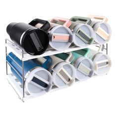 three tiered rack with cups and mugs on it's sides, each holding different colored lids