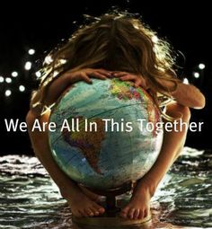 a girl holding a globe in her hands with the words we are all in this together