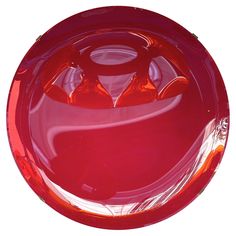 an image of a red object that looks like it is in the middle of a circle