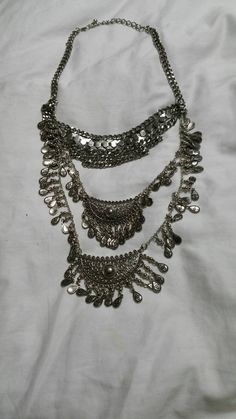 Silver Toned Metal Tear Drop Bead Leaf Style 28 inch Bib Necklace Costume Jewelry This is priced to sell. Very decorative. It a wonderful find. The bib measures 5 inches long and 7 inches wide. Check out our shop for monthly specials. We have a variety of items for every taste. Combine several of our items together to save on shipping. If you have any questions please do not hesitate to ask. I will ship outside of the US, just request a quote. Happy Shopping. I will work around the priority mail Bohemian Silver Long Necklace With Round Beads, Silver Bohemian Long Necklace With Round Beads, Metal Beaded Chain Necklace For Festivals, Costume Jewelry Metal Beaded Necklaces For Festivals, Silver Bohemian Beaded Necklaces With Chain Detail, Silver Bohemian Beaded Necklaces With Chain, Bohemian Silver Layered Metal Necklace, Bohemian Silver Beaded Chain Necklace, Bohemian Silver Layered Necklace