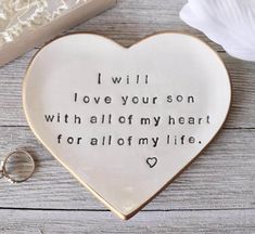 a ceramic heart with the words i will love your son with all of my heart for all of my life