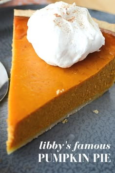 a slice of pumpkin pie with whipped cream on top and the words, library's famous pumpkin pie