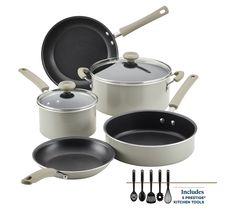 an assortment of pots and pans with utensils