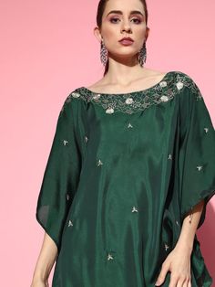 Buy endearing green dual tone floral embroidered kaftan kurta with dhoti pants for women which is crafted from silk blend fabric. This amusing style kurta set goes perfectly for upcoming festive season and grand events. Bollywood Style Kaftan With Floral Embroidery For Party, Floral Embroidered Kaftan With Traditional Drape For Party, Bollywood Style Floral Embroidery Kaftan For Party, Floral Embroidered Kaftan For Party, Bollywood Style Party Kaftan With Floral Embroidery, Party Kaftan With Floral Embroidery And Traditional Drape, Festive Chikankari Embroidered Top, Festive Resham Embroidered Tunic Top, Festive Floral Embroidered Kaftan For Party