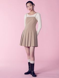 This is a sleeveless mini dress with an attractive minimalist vibe. The light length and cut lines on the body create a slim body line, and the pleated details on the skirt add a casual yet feminine mood.- You can adjust the length of the shoulder straps to fit your body shape.- Open and close with side zipper- Can be worn alone or layered with innerwear such as a T-shirt*The color of the product may differ from the actual color depending on the monitor resolution. Mini Dress With Pleated Back, Spring Mini Dress With Pleated Back, Beige Pleated Skirt Dress, Pleated Sleeveless Mini Dress For Spring, Casual Pleated Dress For Date Night, Sleeveless Summer Mini Dress With Pleated Skirt, Sleeveless Spring Mini Dress With Pleated Bodice, Sleeveless Mini Dress With Pleated Bodice For Spring, Spring Pleated Mini Dress