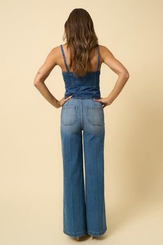 Expertly crafted with high quality materials, the Parker High Rise Wide Leg Jean offers both style and comfort. The medium wash denim exudes a timeless look while the high rise and wide leg design provide a flattering fit. Elevate your wardrobe with these must-have jeans. Comfort stretch denim High rise wide leg Front zipper Front patch pockets Spring High Rise Dark Wash Flare Jeans, High Rise Medium Wash Denim Flare Jeans, High Rise Medium Wash Flare Jeans, High Rise Denim Blue Flare Jeans For Summer, High Rise Flare Jeans In Denim Blue For Summer, Dark Wash Wide Leg Flare Jeans For Summer, Summer Dark Wash Full-length Jeans, Spring Recycled Denim Wide Leg Flare Jeans, Spring Wide Leg Flare Jeans In Recycled Denim