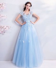 Blue Spring Banquet Dress, Blue Tulle Dress For Banquet, Blue Tulle Dress With Short Sleeves, Blue Evening Dress For Debutante Ball In Spring, Spring Blue Evening Dress For Debutante Ball, Blue Tulle Gown For Spring, Spring Blue Tulle Gown, Light Blue Short Sleeve Banquet Dress, Light Blue Short Sleeve Dress For Banquet