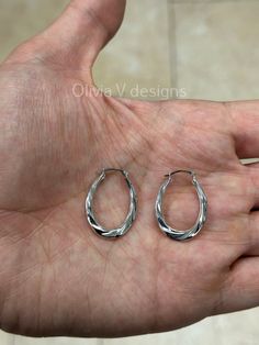 14K White Gold Oval Diamond Cut Hoop Size: 26mm x 20mm Metal: Solid 14K Gold  Estimated Weight: 0.90 Grams These Are Real 14K Gold, Not Filled, Not Plated -These hoop earrings are great for everyday wear.  -Very comfortable and they can be left in your piercings indefinitely! -Very high quality hoops made from pure 14K gold (NOT FILLED) -Sold In PAIRS Brand New, Never Used Arrives in a Velvet Gift Pouch and includes FREE SHIPPING to the USA Within 24 Hours To see more earrings and other handcraf Everyday Oval Nickel-free Hoop Earrings, Oval Nickel-free Hoop Earrings For Everyday Wear, Nickel-free Oval Hoop Earrings For Everyday, Tarnish Resistant Sterling Silver Oval Earrings, White Gold Oval Huggie Earrings For Gift, Oval Sterling Silver Huggie Earrings For Gift, Oval Sterling Silver Huggie Earrings As Gift, Silver Oval Tarnish Resistant Hoop Earrings, Oval Nickel-free Hoop Earrings For Anniversary