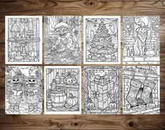 six christmas coloring pages on a wooden table